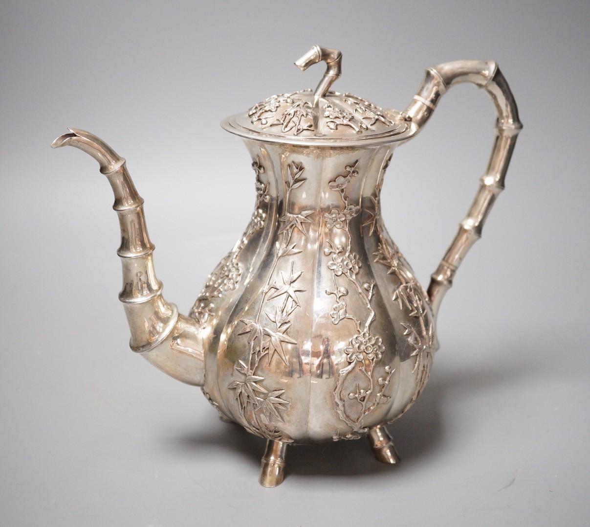 A late 19th/early 20th century Chinese Export white metal coffee pot by Hung Chong, height 20.3cm, gross weight 23.5oz.